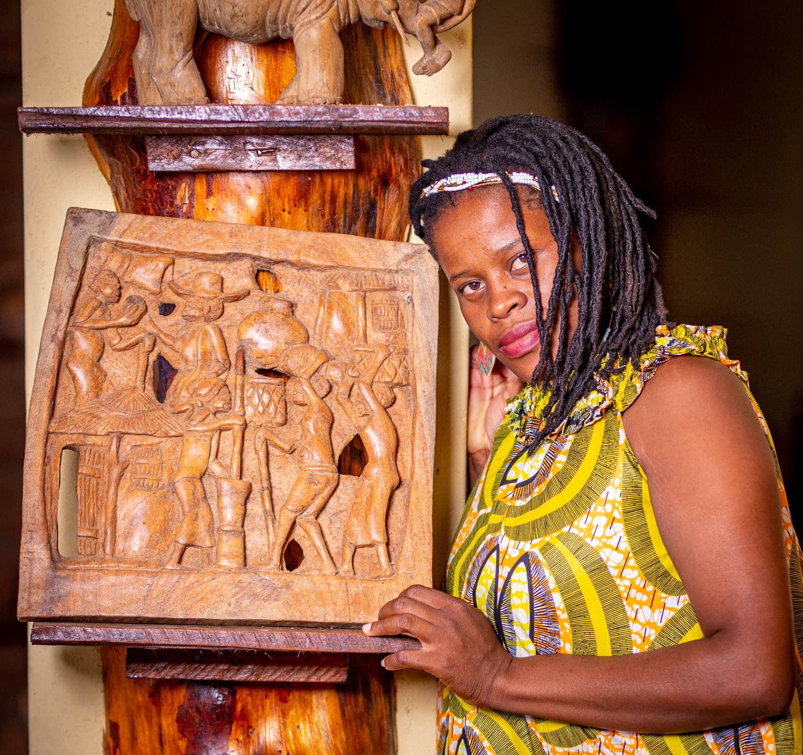Artwork with carved wooden relief